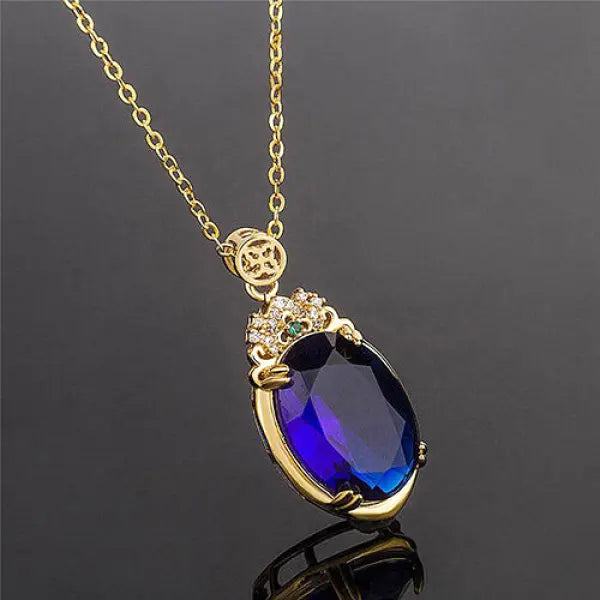 Pendentif Bouddha en Goutte d'Eau – Saphir Bleu