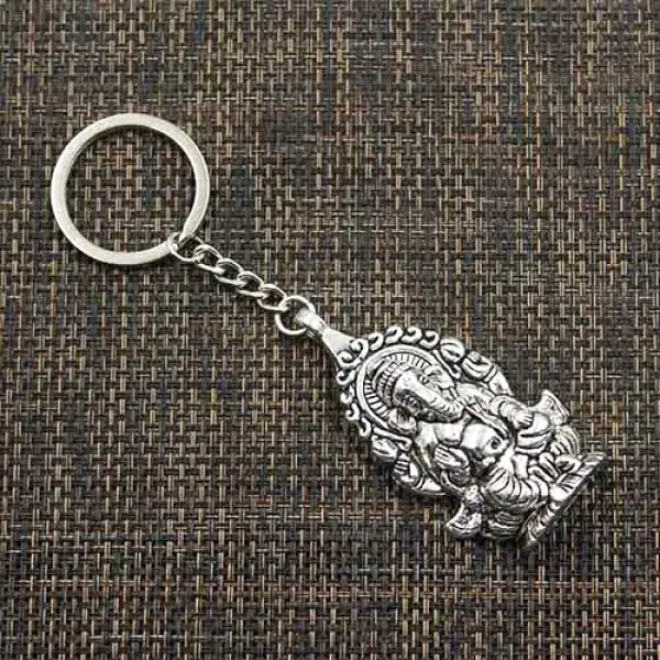 Porte-Clés Ganesh Assis — Édition Signature
