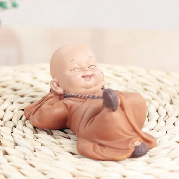 statue-moine-couche