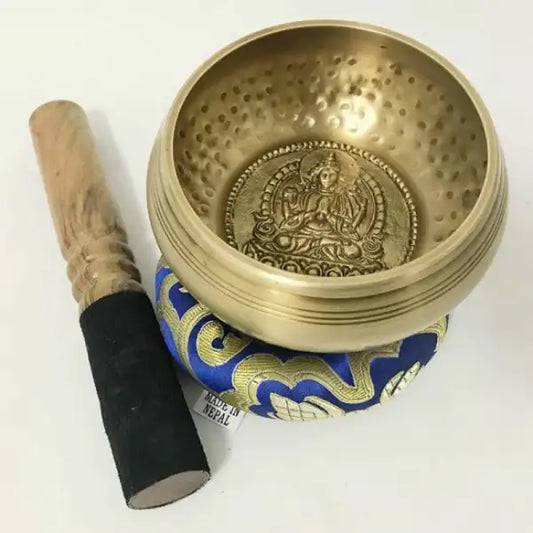 bol-tibetain-chantant-dore-avec-motif-de-bouddha